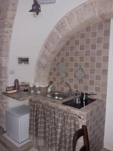 A kitchen or kitchenette at Trulletto dei sogni