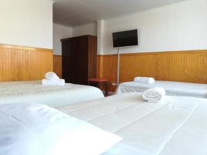 Postel nebo postele na pokoji v ubytování Agostini Hotel + 29 fotografií