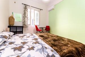 Postel nebo postele na pokoji v ubytování Petaluda House 3