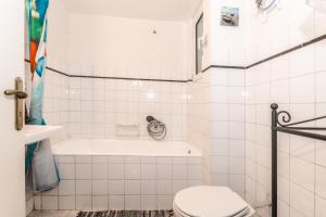 Ett badrum på Petaluda House 3