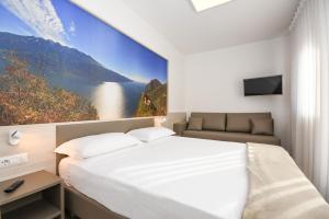 Posteľ alebo postele v izbe v ubytovaní Residence Franca B&B