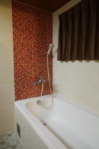 Ванная комната в Ying Dai Hotel