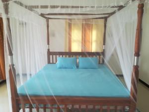 Postel nebo postele na pokoji v ubytování Star Beach Hotel