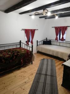 Cama o camas de una habitación en Къща за гости ЧИЧАРИТЕ