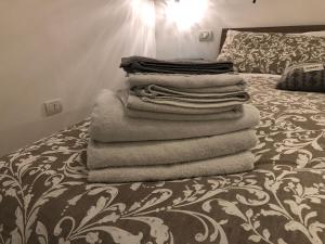 Łóżko lub łóżka w pokoju w obiekcie Casa Comasia
