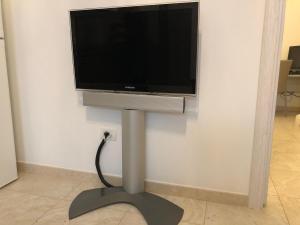 Telewizja i/lub zestaw kina domowego w obiekcie Casa Comasia