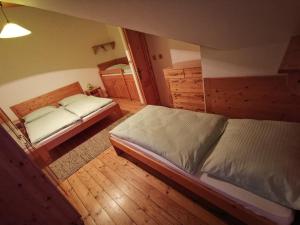 Postel nebo postele na pokoji v ubytování Tatralandia Apartmány Relax