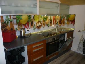 A kitchen or kitchenette at Kleine Auszeit