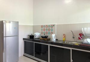 Virtuvė arba virtuvėlė apgyvendinimo įstaigoje Family homestay
