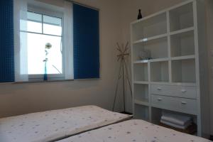 Postel nebo postele na pokoji v ubytování Ferienwohnung Bergblick