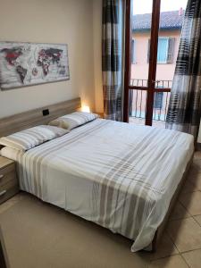 En eller flere senge i et værelse på Corte Magenta