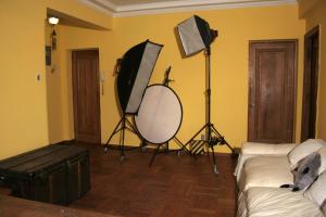 a living room with a camera and a room with a couch at AZUL marino in Santiago