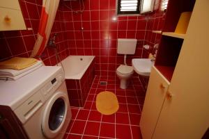 Koupelna v ubytování Apartments Besker