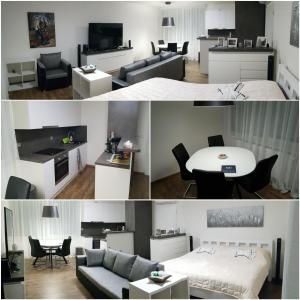 プラハにあるG support apartmentのリビングルーム、ベッドルーム(ソファ、テーブル付)