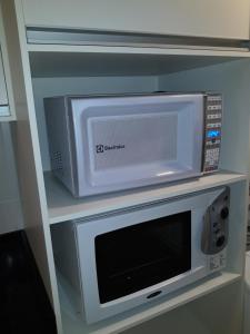 Kuchyň nebo kuchyňský kout v ubytování Apt Interiro Praia de Itapema