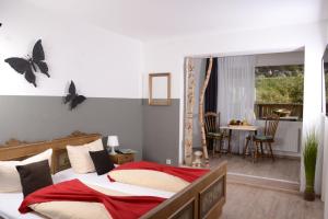 Postel nebo postele na pokoji v ubytování Hotel Großbach
