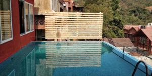 The swimming pool at or close to Villa 408-Dr Wade in Royal Palms Mumbai