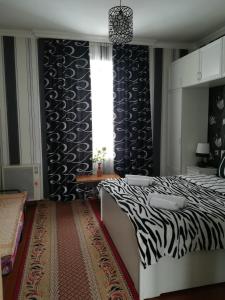 Voodi või voodid majutusasutuse Nikoloz Guesthouse toas