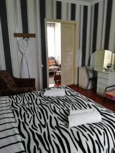 Voodi või voodid majutusasutuse Nikoloz Guesthouse toas