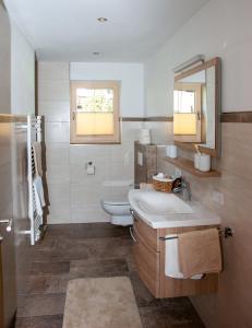 Ένα μπάνιο στο Ferienwohnung Kant