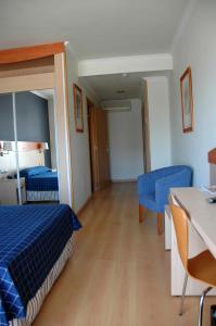 Posteľ alebo postele v izbe v ubytovaní Hotel President
