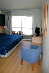 Posteľ alebo postele v izbe v ubytovaní Hotel President