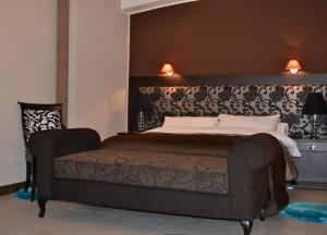 Ein Bett oder Betten in einem Zimmer der Unterkunft Jardy Hotel