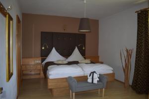 Giường trong phòng chung tại Ferienwohnungen Sunnwies