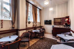 TV a/nebo společenská místnost v ubytování Star Hotel
