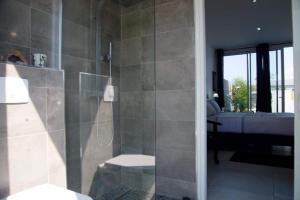 Koupelna v ubytování Maison TONGA piscine jaccuzi