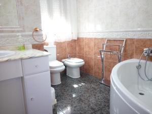 Koupelna v ubytování Armonía + 37 fotografií