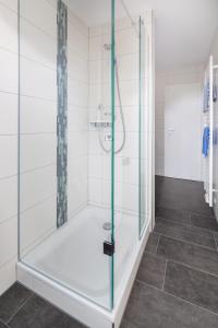 Ein Badezimmer in der Unterkunft Ferienhaus an der Karlstraße