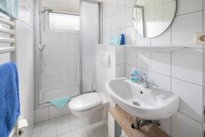 Ein Badezimmer in der Unterkunft Ferienhaus an der Karlstraße
