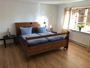 En eller flere senge i et værelse på Landhaus Hohenfelde