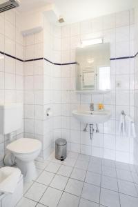 Ein Badezimmer in der Unterkunft Ferienhaus an der Karlstraße