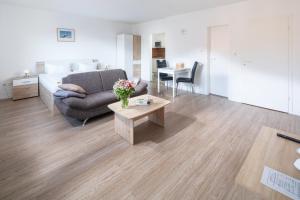 Ein Sitzbereich in der Unterkunft Ferienhaus an der Karlstraße