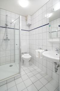 Ein Badezimmer in der Unterkunft Ferienhaus an der Karlstraße