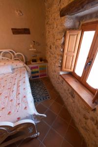 Ένα ή περισσότερα κρεβάτια σε δωμάτιο στο Casilla Fuentes