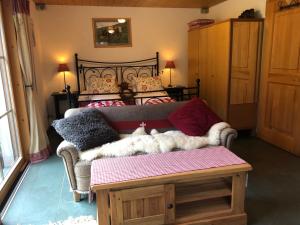 Ein Bett oder Betten in einem Zimmer der Unterkunft Sam & Cindy Mühlemann