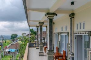 A balcony or terrace at Adhi Jaya Suite