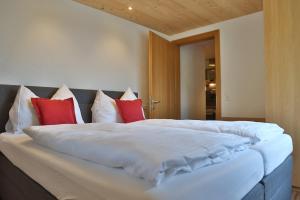 Ліжко або ліжка в номері Bergzeit Appartements