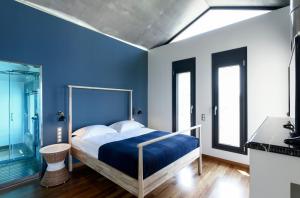 Postel nebo postele na pokoji v ubytování Landmark - ορόσημο