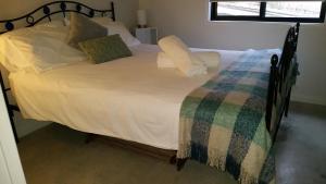 Ένα ή περισσότερα κρεβάτια σε δωμάτιο στο Inn Seaclusion +7 φωτογραφίες