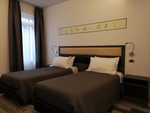 Postel nebo postele na pokoji v ubytování Palazzo IrMa - Hotel - B&B Luxury
