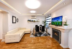 TV a/nebo společenská místnost v ubytování Apartment Markovski