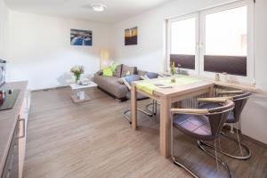 Ein Sitzbereich in der Unterkunft Ferienhaus an der Karlstraße