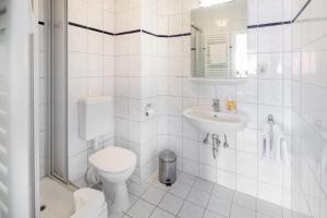 Ein Badezimmer in der Unterkunft Ferienhaus an der Karlstraße