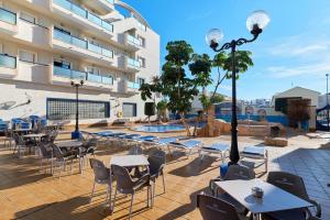 Бассейн в Apartment Eva Cabo Roig или поблизости