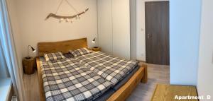 Posteľ alebo postele v izbe v ubytovaní Apartmány BD Boží Dar