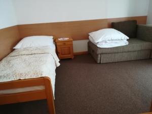 Posteľ alebo postele v izbe v ubytovaní Willa Hamernik AGROTURYSTYKA